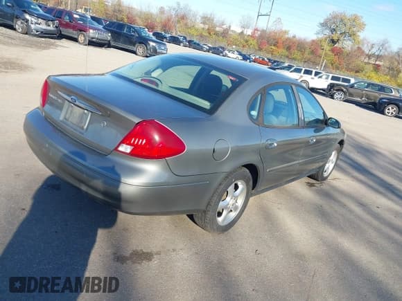 ✅ 2001 Ford Taurus SE • VIN: 1FAFP53S81G133214 • Лот: 43765502. Опубликован ранее на IAAI с пробегом 217 790 миль. Бесплатный доступ к архиву аукционных продаж из США и подробный отчёт об истории автомобиля на DreamBid. Изображение 4.