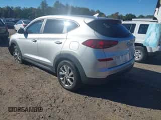 2019 Hyundai Tucson SE z VIN KM8J2CA45KU068092, wystawiony jako IAAI lot #43292384 z przebiegiem 48 771 mil mil oraz . Historia ofert i sprzedaży dostępna na DreamBid. Obrazek 3.