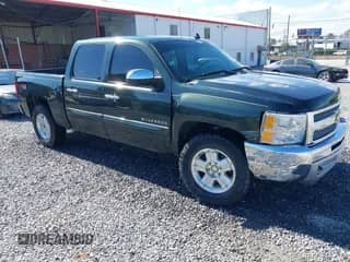 2013 Chevrolet Silverado 1500 LT with VIN 3GCPKSE72DG258905, listed as a IAAI auction lot 43492550 with 170,811 mi miles and . Bid and sale history available at DreamBid. Image 1.