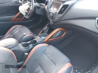 ✅ 2016 Hyundai Veloster Turbo Rally Edition • VIN: KMHTC6AE1GU293195 • Lot: 41176350. Wystawiony na IAAI z przebiegiem 117 088 mil. Bezpłatny archiwum sprzedaży aukcyjnych z USA i szczegółowy raport historii pojazdu na DreamBid. Zdjęcie 5.