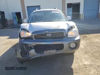 2001 Hyundai Santa Fe GLS z VIN KM8SC83D51U097893, wystawiony jako Copart lot #42773215 z przebiegiem 113 181 mil mil oraz Szkoda całkowita • Salvage title. Historia ofert i sprzedaży dostępna na DreamBid. Obrazek 5.