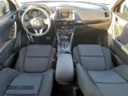 ✅ 2015 Mazda CX-5 Sport • VIN: JM3KE2BE8F0490900 • Лот: 94381785. Опубликован ранее на Copart с пробегом 54 563 миль. Бесплатный доступ к архиву аукционных продаж из США и подробный отчёт об истории автомобиля на DreamBid. Изображение 8.