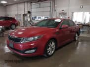 ✅ 2011 Kia Optima EX • VIN: KNAGN4A62B5092354 • Lot: 42772898. Listed on IAAI with 148,901 mi. Free auction sales archive from the USA and detailed vehicle history report at DreamBid. Image 2.