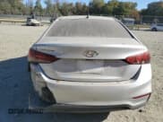 ✅ 2021 Hyundai Accent SE • VIN: 3KPC24A61ME128309 • Lot: 75899654. Wystawiony na Copart z przebiegiem 129 699 mil. Bezpłatny archiwum sprzedaży aukcyjnych z USA i szczegółowy raport historii pojazdu na DreamBid. Zdjęcie 6.