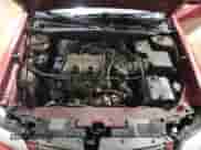 2002 Chevrolet Malibu LS z VIN 1G1NE52J82M651259, wystawiony jako Copart lot #86568314 z przebiegiem 112 524 mil mil oraz Szkoda całkowita • Salvage title. Historia ofert i sprzedaży dostępna na DreamBid. Obrazek 11.