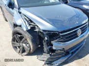 ✅ 2024 Volkswagen Tiguan SE R-Line Black • VIN: 3VVCB7AX2RM010794 • Lot: 41894596. Wystawiony na IAAI z przebiegiem 25 136 mil. Bezpłatny archiwum sprzedaży aukcyjnych z USA i szczegółowy raport historii pojazdu na DreamBid. Zdjęcie 6.