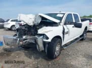 ✅ 2018 Ram 2500 Tradesman • VIN: 3C6UR5CJ3JG300872 • Lot: 42001722. Listed on IAAI with 127,543 mi. Free auction sales archive from the USA and detailed vehicle history report at DreamBid. Image 18.