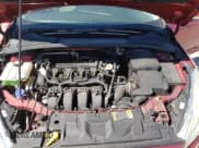 ✅ 2016 Ford Focus Titanium • VIN: 1FADP3N29GL330551 • Lot: 68920295. Wystawiony na Copart z przebiegiem 179 651 mil. Bezpłatny archiwum sprzedaży aukcyjnych z USA i szczegółowy raport historii pojazdu na DreamBid. Zdjęcie 11.