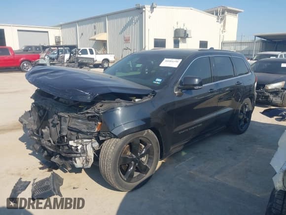 ✅ 2016 Jeep Grand Cherokee Overland • VIN: 1C4RJFCT6GC471673 • Lot: 40584190. Listed on IAAI with 128,482 mi. Free auction sales archive from the USA and detailed vehicle history report at DreamBid. Image 2.