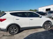 ✅ 2016 Hyundai Santa Fe • VIN: 5XYZU3LA1GG351294 • Лот: 43922733. Опубликован ранее на IAAI с пробегом 112 605 миль. Бесплатный доступ к архиву аукционных продаж из США и подробный отчёт об истории автомобиля на DreamBid. Изображение 13.