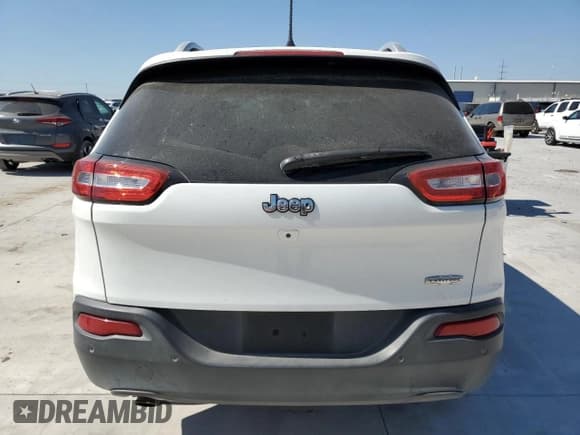 ✅ 2016 Jeep Cherokee Latitude • VIN: 1C4PJLCB9GW363723 • Lot: 82461115. Listed on Copart with 118,600 mi. Free auction sales archive from the USA and detailed vehicle history report at DreamBid. Image 6.