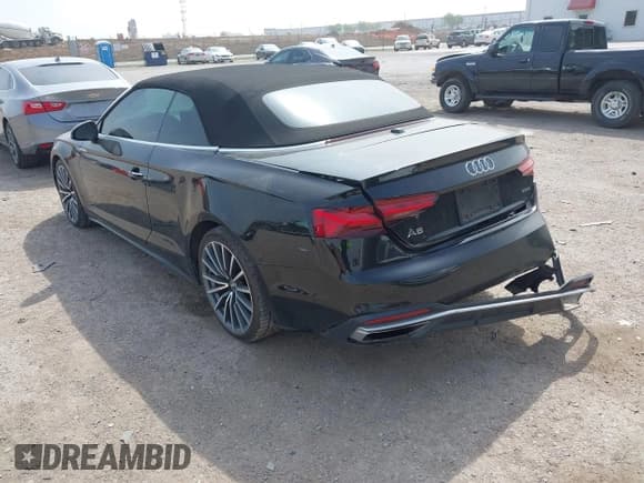 ✅ 2020 Audi A5 Cabriolet Premium • VIN: WAUWNGF50LN000334 • Лот: 41919556. Опубликован ранее на IAAI с пробегом 56 494 миль. Бесплатный доступ к архиву аукционных продаж из США и подробный отчёт об истории автомобиля на DreamBid. Изображение 3.