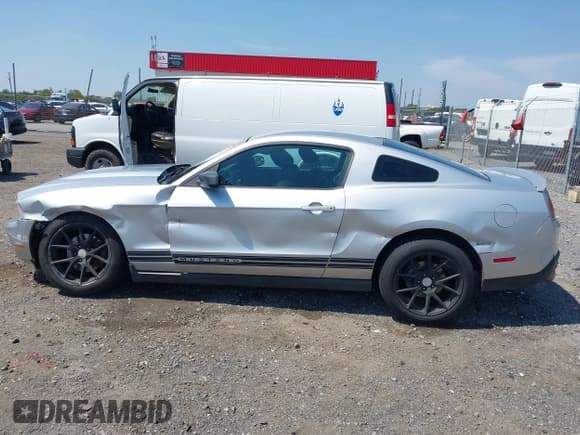 ✅ 2012 Ford Mustang V6 • VIN: 1ZVBP8AM4C5234747 • Lot: 43123966. Listed on IAAI with 196,457 mi. Free auction sales archive from the USA and detailed vehicle history report at DreamBid. Image 14.