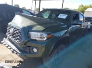 ✅ 2021 Toyota Tacoma SR5 • VIN: 3TMDZ5BNXMM113213 • Lot: 42820845. Listed on IAAI with 95,334 mi. Free auction sales archive from the USA and detailed vehicle history report at DreamBid. Image 2.