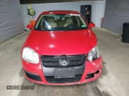 ✅ 2009 Volkswagen Jetta SE • VIN: 3VWRZ71K69M011873 • Lot: 52881525. Listed on Copart with 154,441 mi. Free auction sales archive from the USA and detailed vehicle history report at DreamBid. Image 5.