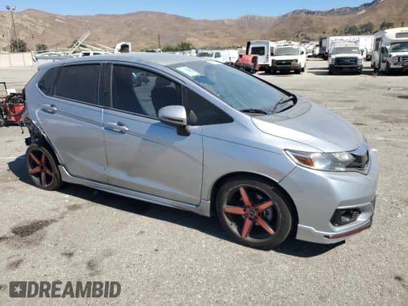 ✅ 2019 Honda Fit Sport • VIN: 3HGGK5H69KM727556 • Лот: 71736135. Опубликован ранее на Copart с пробегом 102 773 миль. Бесплатный доступ к архиву аукционных продаж из США и подробный отчёт об истории автомобиля на DreamBid. Изображение 4.