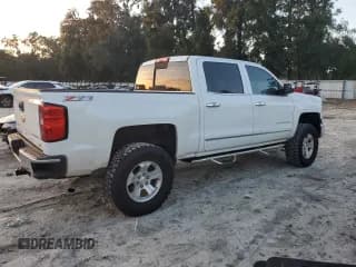 ✅ 2015 Chevrolet Silverado 1500 LTZ • VIN: 3GCUKSEC8FG116416 • Лот: 75495644. Опубликован ранее на Copart с пробегом 128 060 миль. Бесплатный доступ к архиву аукционных продаж из США и подробный отчёт об истории автомобиля на DreamBid. Изображение 3.