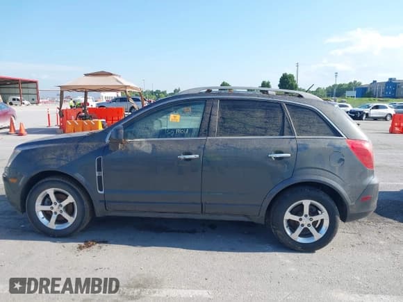 ✅ 2013 Chevrolet Captiva Sport LTZ • VIN: 3GNAL4EK8DS557144 • Lot: 42762179. Wystawiony na IAAI z przebiegiem 198 177 mil. Bezpłatny archiwum sprzedaży aukcyjnych z USA i szczegółowy raport historii pojazdu na DreamBid. Zdjęcie 13.
