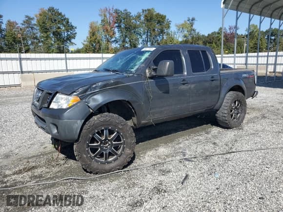 ✅ 2011 Nissan Frontier Pro-4X • VIN: 1N6AD0EV7BC407602 • Lot: 86077835. Listed on Copart with 190,876 mi. Free auction sales archive from the USA and detailed vehicle history report at DreamBid. Image 1.