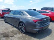 ✅ 2023 Maserati Quattroporte Modena Q4 • VIN: ZAM56YRM8PX420272 • Lot: 42623676. Listed on IAAI with 23,869 mi. Free auction sales archive from the USA and detailed vehicle history report at DreamBid. Image 3.