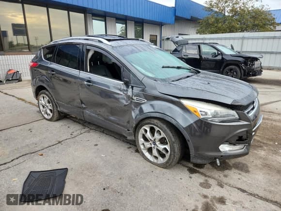 ✅ 2015 Ford Escape Titanium • VIN: 1FMCU9J9XFUA88037 • Lot: 81329605. Listed on Copart with 106,948 mi. Free auction sales archive from the USA and detailed vehicle history report at DreamBid. Image 4.