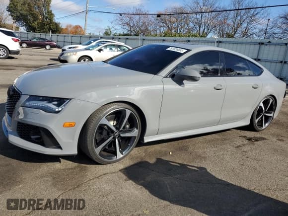 ✅ 2014 Audi RS 7 Prestige • VIN: WUAW2AFC6EN902998 • Lot: 79103904. Listed on Copart with 70,342 mi. Free auction sales archive from the USA and detailed vehicle history report at DreamBid. Image 1.