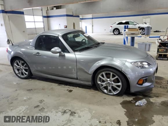 ✅ 2013 Mazda MX-5 Miata Grand Touring • VIN: JM1NC2PFXD0229925 • Lot: 72077055. Listed on Copart with 41,065 mi. Free auction sales archive from the USA and detailed vehicle history report at DreamBid. Image 4.