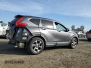 ✅ 2018 Honda CR-V EX-L • VIN: 5J6RW1H89JA005516 • Лот: 91454345. Опубликован ранее на Copart с пробегом 107 675 миль. Бесплатный доступ к архиву аукционных продаж из США и подробный отчёт об истории автомобиля на DreamBid. Изображение 3.