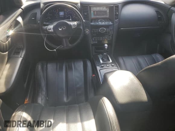 ✅ 2015 Infiniti QX70 • VIN: JN8CS1MW9FM482016 • Lot: 91623355. Listed on Copart with 126,685 mi. Free auction sales archive from the USA and detailed vehicle history report at DreamBid. Image 8.