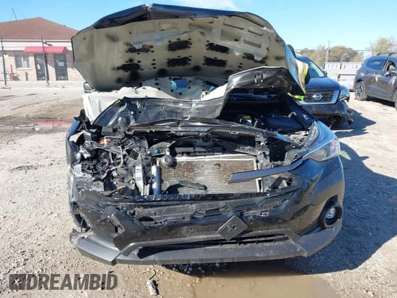 ✅ 2024 Subaru Crosstrek Premium • VIN: JF2GUADC1R8307092 • Лот: 43457550. Опубликован ранее на IAAI с пробегом 62 562 миль. Бесплатный доступ к архиву аукционных продаж из США и подробный отчёт об истории автомобиля на DreamBid. Изображение 6.