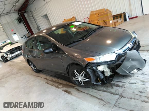 ✅ 2014 Honda Insight LX • VIN: JHMZE2H54ES001814 • Lot: 34520468. Wystawiony na IAAI z przebiegiem 168 581 mil. Bezpłatny archiwum sprzedaży aukcyjnych z USA i szczegółowy raport historii pojazdu na DreamBid. Zdjęcie 1.