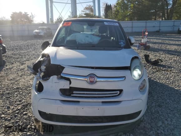 ✅ 2014 FIAT 500L Easy • VIN: ZFBCFABH4EZ023856 • Lot: 76285024. Listed on Copart with 131,343 mi. Free auction sales archive from the USA and detailed vehicle history report at DreamBid. Image 5.