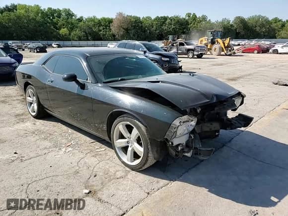✅ 2012 Dodge Challenger SXT • VIN: 2C3CDYAG4CH118276 • Lot: 70877304. Wystawiony na Copart z przebiegiem 118 691 mil. Bezpłatny archiwum sprzedaży aukcyjnych z USA i szczegółowy raport historii pojazdu na DreamBid. Zdjęcie 11.