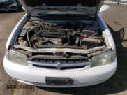 ✅ 1998 Nissan Altima XE • VIN: 1N4DL01D1WC260737 • Лот: 44421064. Опубликован ранее на Copart с пробегом 117 023 миль. Бесплатный доступ к архиву аукционных продаж из США и подробный отчёт об истории автомобиля на DreamBid. Изображение 11.