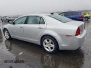 ✅ 2012 Chevrolet Malibu 1LS • VIN: 1G1ZB5E0XCF228055 • Lot: 82209343. Listed on Copart with 105,148 mi. Free auction sales archive from the USA and detailed vehicle history report at DreamBid. Image 2.