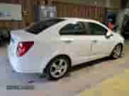 2012 Chevrolet Sonic LTZ with VIN 1G1JE5SH9C4143735, listed as a Copart auction lot 47083355 with 109,585 mi miles and Salvage title. Bid and sale history available at DreamBid. Image 3.