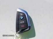 ✅ 2018 BMW X1 xDrive28i • VIN: WBXHT3C38J3H30018 • Lot: 43694942. Listed on IAAI with 50,899 mi. Free auction sales archive from the USA and detailed vehicle history report at DreamBid. Image 11.