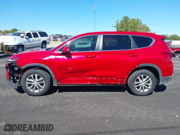 ✅ 2020 Hyundai Santa Fe SE • VIN: 5NMS23AD4LH255650 • Lot: 43432254. Listed on IAAI with 87,711 mi. Free auction sales archive from the USA and detailed vehicle history report at DreamBid. Image 14.