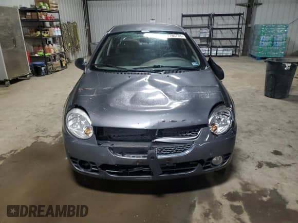 2004 Dodge Neon SXT z VIN 1B3ES56C44D641392, wystawiony jako Copart lot #47780735 z przebiegiem 75 284 mil mil oraz Szkoda całkowita • Salvage title. Historia ofert i sprzedaży dostępna na DreamBid. Obrazek 5.