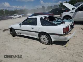 ✅ 1986 Toyota Supra • VIN: JT2MA70L7G0014661 • Lot: 72161554. Wystawiony na Copart z przebiegiem 160 516 mil. Bezpłatny archiwum sprzedaży aukcyjnych z USA i szczegółowy raport historii pojazdu na DreamBid. Zdjęcie 2.