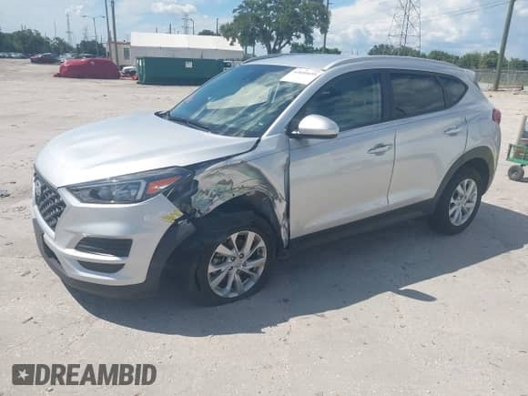 2019 Hyundai Tucson Value with VIN KM8J33A41KU024409, listed as a IAAI auction lot 42601659 with 40,747 mi miles and . Bid and sale history available at DreamBid. Image 2.