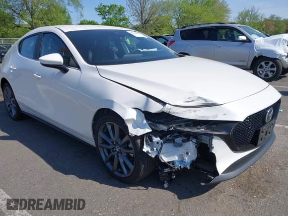 ✅ 2021 Mazda 3 Select • VIN: JM1BPBKL4M1313527 • Lot: 42167648. Listed on IAAI with 36,296 mi. Free auction sales archive from the USA and detailed vehicle history report at DreamBid. Image 1.