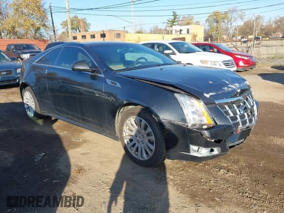 ✅ 2014 Cadillac CTS Performance • VIN: 1G6DG1E35E0169673 • Lot: 43698420. Listed on IAAI with 84,034 mi. Free auction sales archive from the USA and detailed vehicle history report at DreamBid. Image 1.