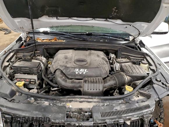 ✅ 2013 Jeep Grand Cherokee Laredo • VIN: 1C4RJFAG0DC582088 • Lot: 94437975. Listed on Copart with 136,143 mi. Free auction sales archive from the USA and detailed vehicle history report at DreamBid. Image 12.