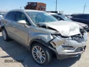 ✅ 2015 Lincoln MKC • VIN: 5LMCJ1A95FUJ32615 • Lot: 42934780. Listed on IAAI with 87,820 mi. Free auction sales archive from the USA and detailed vehicle history report at DreamBid. Image 1.