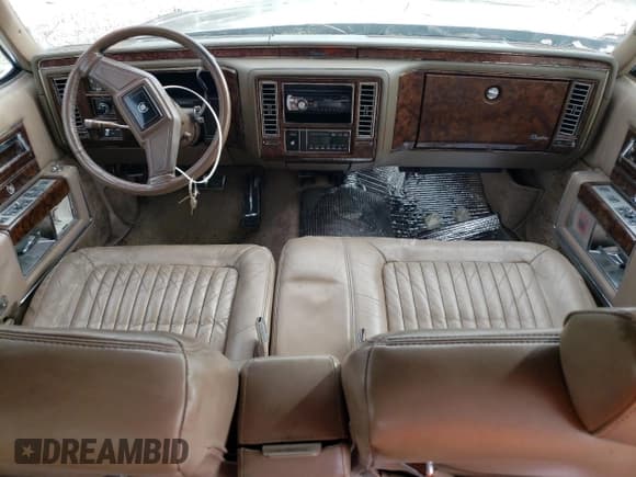 ✅ 1992 Cadillac Brougham • VIN: 1G6DW5477NR701368 • Лот: 86769755. Опубликован ранее на Copart с пробегом Не указан. Бесплатный доступ к архиву аукционных продаж из США и подробный отчёт об истории автомобиля на DreamBid. Изображение 8.