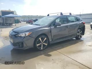 ✅ 2018 Subaru Impreza Special Sports • VIN: 4S3GTAK66J1740449 • Lot: 82073075. Listed on Copart with 113,757 mi. Free auction sales archive from the USA and detailed vehicle history report at DreamBid. Image 1.