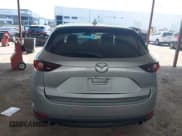 ✅ 2020 Mazda CX-5 Touring • VIN: JM3KFACM8L1770738 • Lot: 43237475. Wystawiony na IAAI z przebiegiem 96 169 mil. Bezpłatny archiwum sprzedaży aukcyjnych z USA i szczegółowy raport historii pojazdu na DreamBid. Zdjęcie 16.