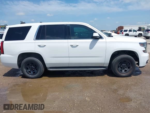 ✅ 2016 Chevrolet Tahoe Commercial • VIN: 1GNLCDEC5GR228457 • Lot: 42671897. Listed on IAAI with 127,987 mi. Free auction sales archive from the USA and detailed vehicle history report at DreamBid. Image 13.