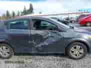 2013 Chevrolet Sonic LT with VIN 1G1JC6SG2D4148084, listed as a IAAI auction lot 43459236 with 94,963 mi miles and . Bid and sale history available at DreamBid. Image 6.